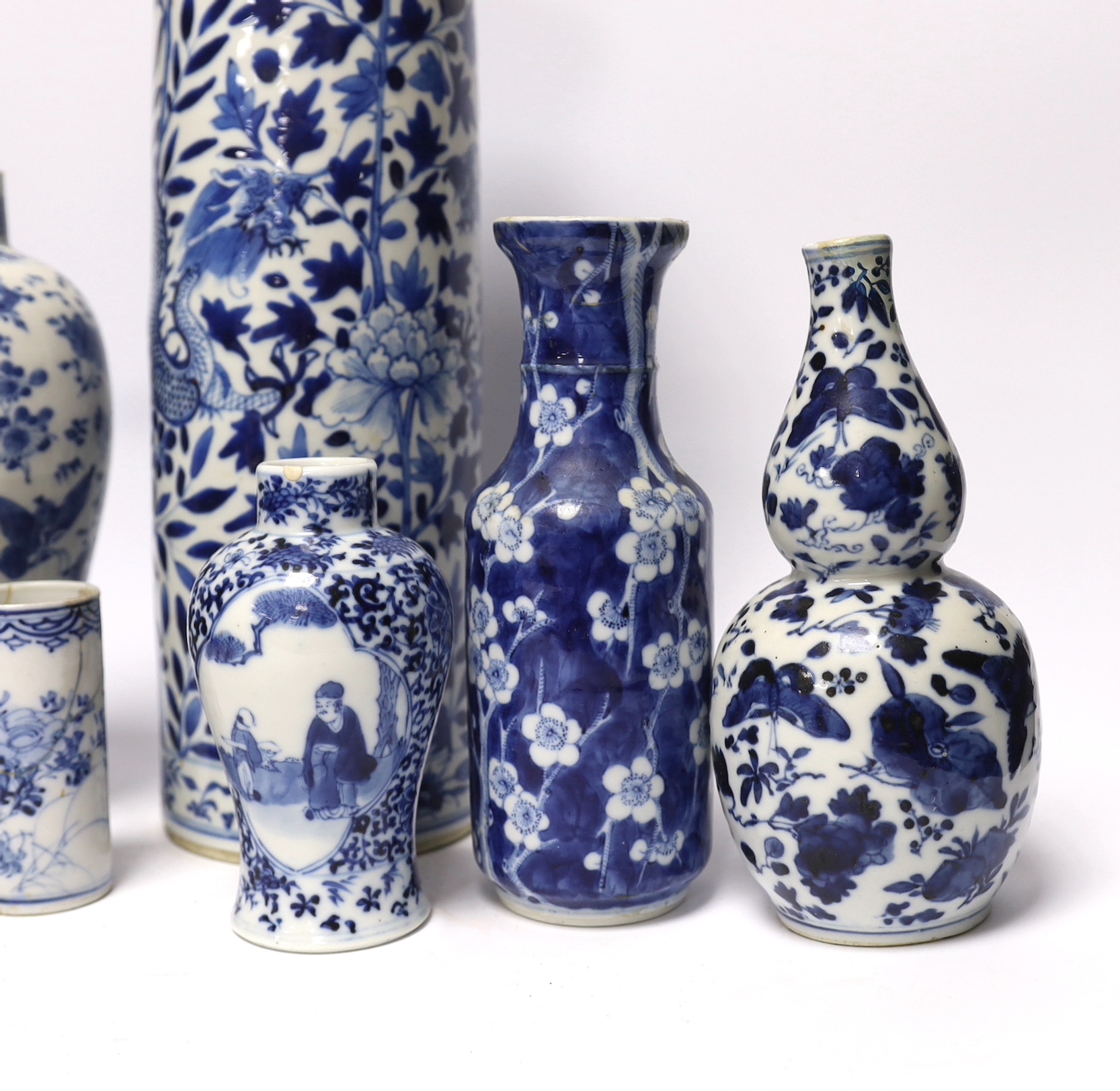 Seven assorted late 19th century Chinese blue and white vases (a.f.), tallest 35.5cm